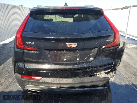 2023 Cadillac XT4 FWD Premium Luxury z VIN 1GYFZCR44PF175022, wystawiony jako Copart lot #49214855 z przebiegiem 50 234 mil mil oraz Nie do naprawy • Non repairable. Historia ofert i sprzedaży dostępna na DreamBid. Obrazek 6.