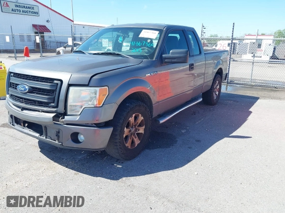 2013 Ford F-150 XL with VIN 1FTFX1CF5DKF69285, listed as a IAAI auction lot 41867360 with 141,111 mi miles. Bid and sale history available at carsss.com. Image 2.