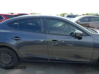 2015 Mazda 3 i Sport z VIN 3MZBM1U73FM190390, wystawiony jako IAAI lot #42235160 z przebiegiem 156 539 mil mil oraz . Historia ofert i sprzedaży dostępna na DreamBid. Obrazek 13.