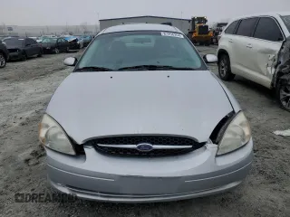 2000 Ford Taurus SE with VIN 1FAFP53U6YA132385, listed as a Copart auction lot 87256354 with 160,109 mi miles and Salvage Title. Bid and sale history available at DreamBid. Image 5.