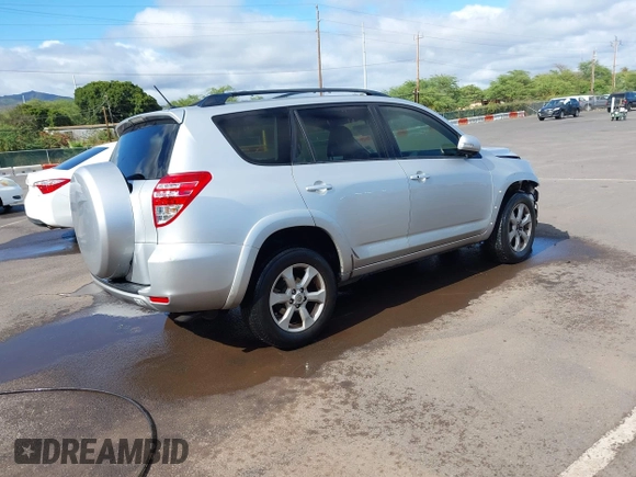 2012 Toyota RAV4 Limited with VIN JTMYF4DV1CD033746, listed as a IAAI auction lot 41982264 with 61,527 mi miles and . Bid and sale history available at DreamBid. Image 4.
