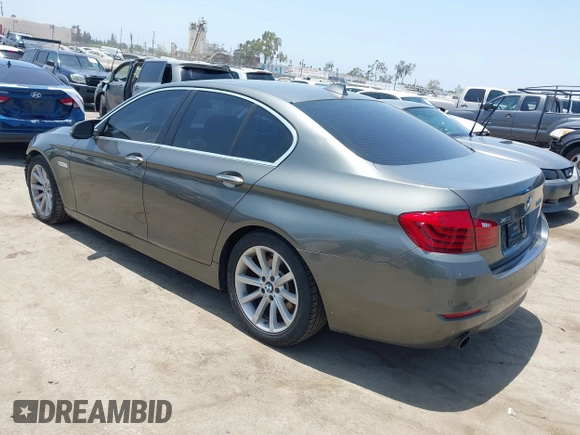 2014 BMW 5 Series 535i xDrive with VIN WBA5B3C57ED531072, listed as a IAAI auction lot 42574991 with 104,304 mi miles and . Bid and sale history available at DreamBid. Image 3.