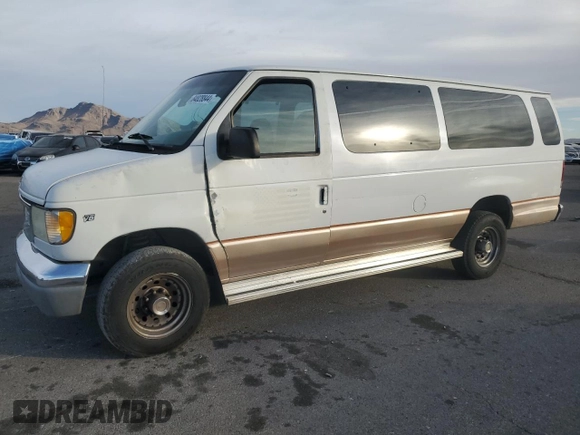 2000 Ford Econoline Passenger XL with VIN 1FBSS31L5YHA09064, listed as a Copart auction lot 84828844 with 257,973 mi miles and Salvage Title. Bid and sale history available at DreamBid. Image 1.