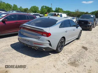 2022 Kia K5 GT-Line z VIN 5XXG64J23NG156401, wystawiony jako IAAI lot #42051123 z przebiegiem 71 853 mil mil oraz . Historia ofert i sprzedaży dostępna na DreamBid. Obrazek 4.