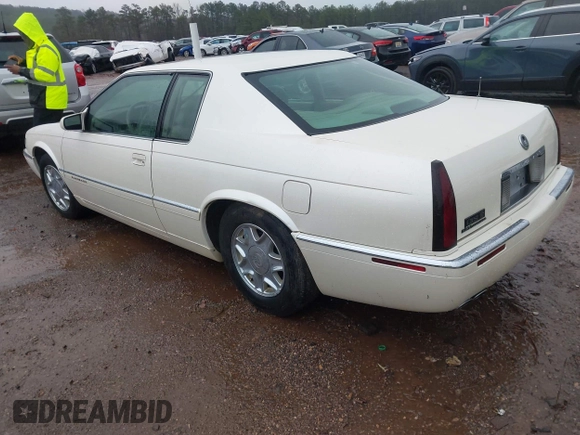1997 Cadillac Eldorado ESC z VIN 1G6EL12Y6VU614754, wystawiony jako IAAI lot #41543611 z przebiegiem 73 273 mil mil oraz . Historia ofert i sprzedaży dostępna na DreamBid. Obrazek 3.