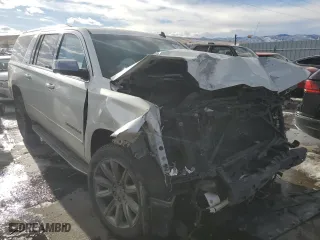2015 Chevrolet Suburban LTZ with VIN 1GNSKKKC3FR303517, listed as a Copart auction lot 42129085 with 0 mi miles and Salvage Title. Bid and sale history available at carsss.com. Image 4.