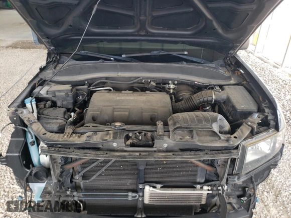 2012 Honda Ridgeline Sport z VIN 5FPYK1F76CB001867, wystawiony jako Copart lot #57944775 z przebiegiem 92 900 mil mil oraz Szkoda całkowita • Salvage title. Historia ofert i sprzedaży dostępna na DreamBid. Obrazek 11.