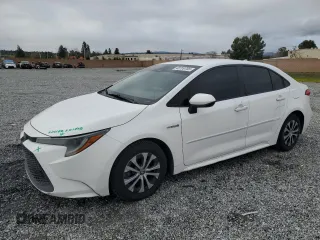 2021 Toyota Corolla Hybrid LE with VIN JTDEAMDE3MJ013373, listed as a Copart auction lot 48709785 with 136,422 mi miles and Salvage Title. Bid and sale history available at carsss.com. Image 1.