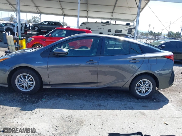 2022 Toyota Prius L Eco with VIN JTDKAMFU2N3172026, listed as a IAAI auction lot 41841090 with 49,011 mi miles. Bid and sale history available at carsss.com. Image 13.