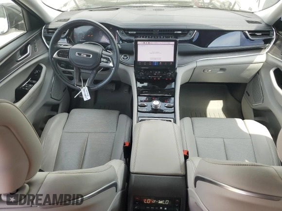 2023 Jeep Grand Cherokee Overland with VIN 1C4RJHDG9PC517056, listed as a Copart auction lot 54929955 with 18,418 mi miles and Salvage title. Bid and sale history available at DreamBid. Image 8.