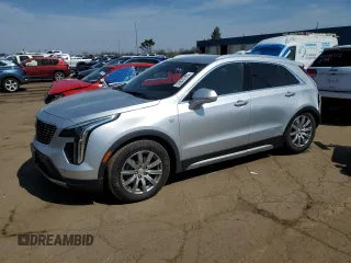 2020 Cadillac XT4 AWD Premium Luxury z VIN 1GYFZDR44LF026447, wystawiony jako Copart lot #53970785 z przebiegiem 118 035 mil mil oraz Szkody całkowita. Historia ofert i sprzedaży dostępna na DreamBid. Obrazek 1.