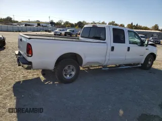 2003 Ford F-350 XL with VIN 1FTSW30F63EB07672, listed as a Copart auction lot 76659184 with 243,580 mi miles and Salvage Title. Bid and sale history available at DreamBid. Image 3.