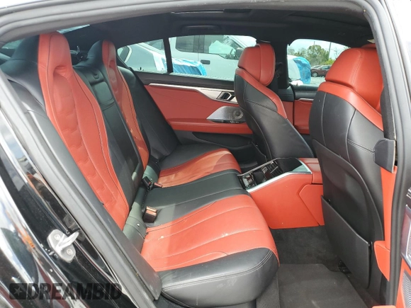2020 BMW 8 Series M850i z VIN WBAGV8C06LBP48901, wystawiony jako Copart lot #57595725 z przebiegiem 88 332 mil mil oraz Czysty tytuł • Clean title. Historia ofert i sprzedaży dostępna na DreamBid. Obrazek 10.