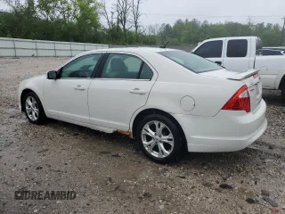 2012 Ford Fusion SE z VIN 3FAHP0HA4CR185059, wystawiony jako Copart lot #56875985 z przebiegiem 173 644 mil mil oraz Nie do naprawy. Historia ofert i sprzedaży dostępna na DreamBid. Obrazek 2.
