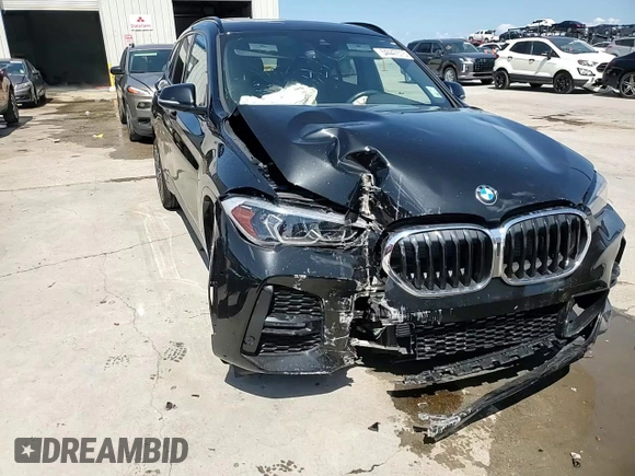2021 BMW X1 sDrive28i z VIN WBXJG7C04M5U03124, wystawiony jako Copart lot #54447515 z przebiegiem 11 794 mil mil oraz Szkoda całkowita • Salvage title. Historia ofert i sprzedaży dostępna na DreamBid. Obrazek 14.