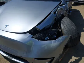 2024 Tesla Model Y Performance with VIN 7SAYGDEF9RA299036, listed as a IAAI auction lot 42140788 with 14,844 mi miles and . Bid and sale history available at DreamBid. Image 20.