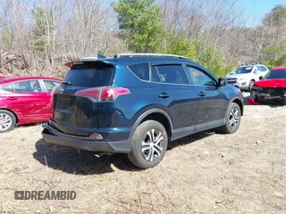 2017 Toyota RAV4 LE with VIN JTMBFREV9HJ704140, listed as a IAAI auction lot 41825116 with 75,007 mi miles and . Bid and sale history available at carsss.com. Image 4.