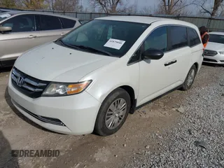 2014 Honda Odyssey LX with VIN 5FNRL5H24EB001551, listed as a IAAI auction lot 41879040 with 119,200 mi miles and . Bid and sale history available at DreamBid. Image 17.