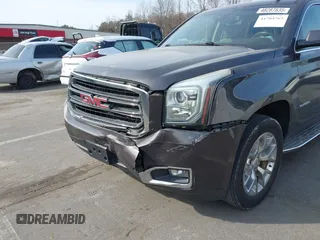2015 GMC Yukon SLE with VIN 1GKS1AKCXFR269862, listed as a IAAI auction lot 41784763 with 156,286 mi miles. Bid and sale history available at carsss.com. Image 6.