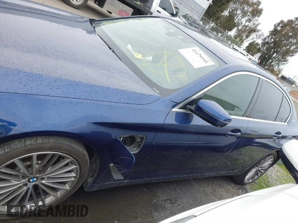 2019 BMW 5 Series 530e iPerformance with VIN WBAJA9C59KB389898, listed as a IAAI auction lot 41479595 with 90,965 mi miles. Bid and sale history available at carsss.com. Image 14.