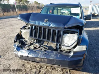 2008 Jeep Liberty Sport with VIN 1J8GN28K08W278092, listed as a IAAI auction lot 41215325 with 127,581 mi miles. Bid and sale history available at carsss.com. Image 6.