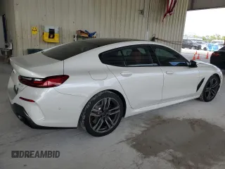 2023 BMW 8 Series 840i with VIN WBAGV4C00PCL13414, listed as a Copart auction lot 51512755 with 23,133 mi miles and Salvage title. Bid and sale history available at DreamBid. Image 3.