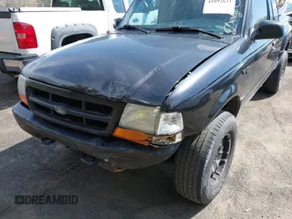 1999 Ford Ranger XL with VIN 1FTZR15V3XPB55652, listed as a IAAI auction lot 41892631 with 238,995 mi miles. Bid and sale history available at carsss.com. Image 6.