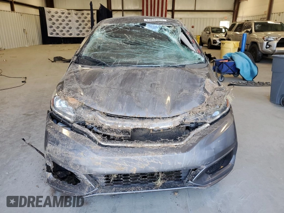 2020 Honda Fit LX z VIN 3HGGK5H46LM710780, wystawiony jako Copart lot #53032525 z przebiegiem 102 541 mil mil oraz Szkoda całkowita • Salvage title. Historia ofert i sprzedaży dostępna na DreamBid. Obrazek 5.
