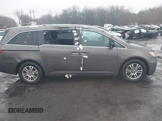 2012 Honda Odyssey EX-L with VIN 5FNRL5H64CB037689, listed as a IAAI auction lot 41857822 with 121,601 mi miles and . Bid and sale history available at carsss.com. Image 13.