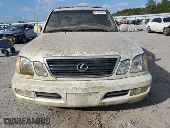 2002 Lexus LX 470 z VIN JTJHT00W623517039, wystawiony jako Copart lot #51458785 z przebiegiem 219 906 mil mil oraz Tytuł czysty. Historia ofert i sprzedaży dostępna na DreamBid. Obrazek 5.