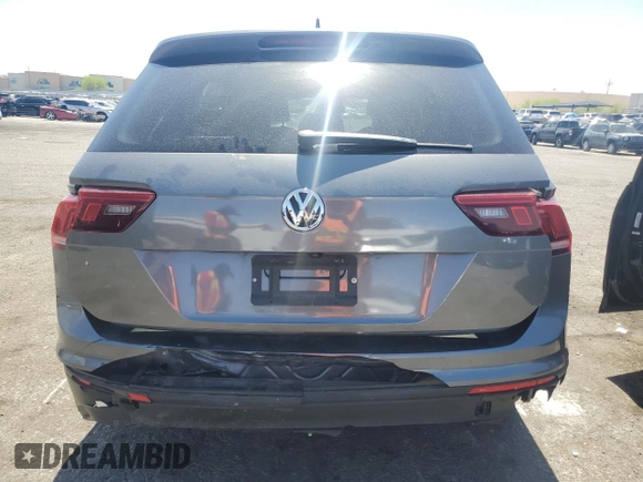 2020 Volkswagen Tiguan S z VIN 3VV1B7AX8LM053566, wystawiony jako Copart lot #53362515 z przebiegiem 87 450 mil mil oraz Szkoda całkowita • Salvage title. Historia ofert i sprzedaży dostępna na DreamBid. Obrazek 6.