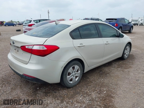 2015 Kia Forte LX with VIN KNAFK4A66F5314811, listed as a IAAI auction lot 42054640 with 123,901 mi miles. Bid and sale history available at carsss.com. Image 4.