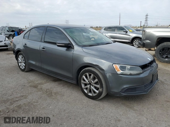 2012 Volkswagen Jetta SE with VIN 3VWDX7AJ5CM344631, listed as a Copart auction lot 49895435 with 176,922 mi miles and Salvage title. Bid and sale history available at DreamBid. Image 4.