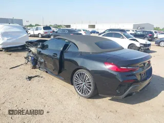 2022 BMW 8 Series with VIN WBAFY4C04NCJ78602, listed as a IAAI auction lot 42034279 with 11,757 mi miles and . Bid and sale history available at DreamBid. Image 3.