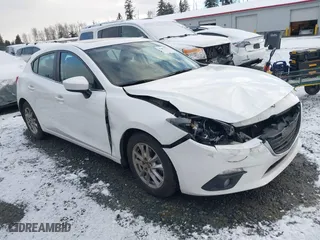 2016 Mazda Mazda3 i Grand Touring with VIN 3MZBM1N77GM319103, listed as a IAAI auction lot 41472772 with 82,833 mi miles. Bid and sale history available at carsss.com. Image 1.