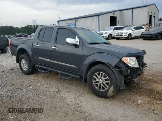 2014 Nissan Frontier SV with VIN 1N6AD0ER0EN751705, listed as a Copart auction lot 55613335 with 204,017 mi miles and Salvage title. Bid and sale history available at DreamBid. Image 4.