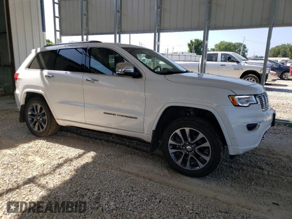 2018 Jeep Grand Cherokee Overland z VIN 1C4RJFCG4JC425589, wystawiony jako Copart lot #61775775 z przebiegiem 102 040 mil mil oraz Szkoda całkowita • Salvage title. Historia ofert i sprzedaży dostępna na DreamBid. Obrazek 4.