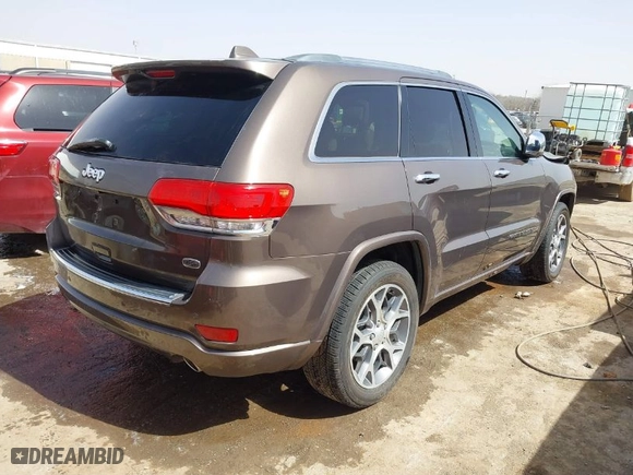 2020 Jeep Grand Cherokee Overland with VIN 1C4RJECG8LC323824, listed as a IAAI auction lot 41757922 with 64,792 mi miles. Bid and sale history available at carsss.com. Image 4.