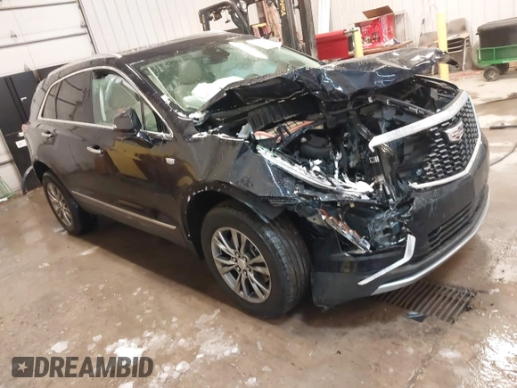 2021 Cadillac XT5 AWD Premium Luxury with VIN 1GYKNDR41MZ156521, listed as a IAAI auction lot 41554791 with 30,871 mi miles and . Bid and sale history available at DreamBid. Image 1.