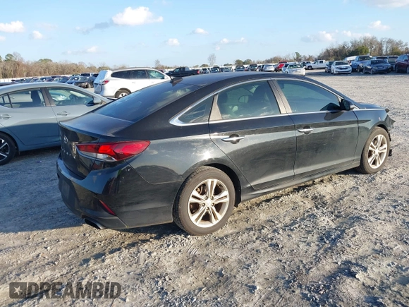2018 Hyundai Sonata Sport with VIN 5NPE34AF1JH599695, listed as a IAAI auction lot 41231886 with 109,743 mi miles and . Bid and sale history available at carsss.com. Image 4.