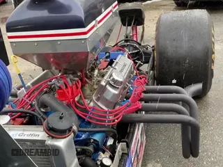 2000 Ford Mustang z VIN 0F4840, wystawiony jako Copart lot #81281855 z przebiegiem 10 mil mil oraz Szkoda całkowita • Salvage title. Historia ofert i sprzedaży dostępna na DreamBid. Obrazek 11.