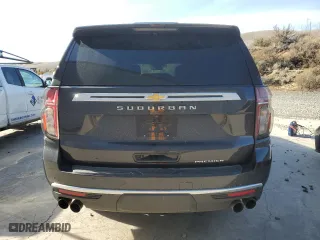 2023 Chevrolet Suburban Premier with VIN 1GNSCFKD5PR394675, listed as a Copart auction lot 49641395 with 56,946 mi miles and Salvage Title. Bid and sale history available at carsss.com. Image 6.