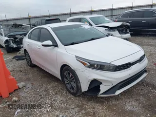 2022 Kia Forte LXS z VIN 3KPF24AD2NE474138, wystawiony jako IAAI lot #41107437 z przebiegiem 87 490 mil mil oraz . Historia ofert i sprzedaży dostępna na DreamBid. Obrazek 1.