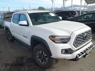 2023 Toyota Tacoma 4WD SR with VIN 3TMCZ5AN7PM638828, listed as a IAAI auction lot 41360904 with 19,045 mi miles. Bid and sale history available at carsss.com. Image 1.