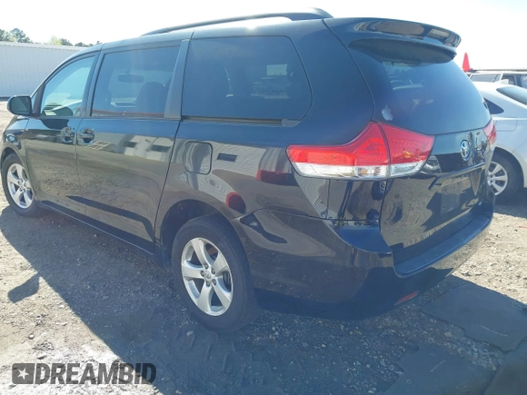 2012 Toyota Sienna LE AAS with VIN 5TDKK3DC3CS263240, listed as a IAAI auction lot 41810686 with 232,026 mi miles. Bid and sale history available at carsss.com. Image 3.