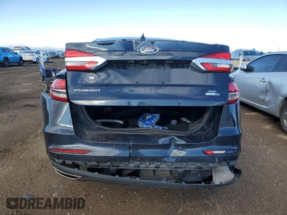 2020 Ford Fusion SE z VIN 3FA6P0T9XLR236729, wystawiony jako Copart lot #47771045 z przebiegiem 54 947 mil mil oraz Szkoda całkowita • Salvage title. Historia ofert i sprzedaży dostępna na DreamBid. Obrazek 6.