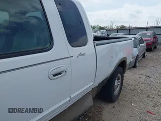 2003 Ford F-150 XL with VIN 1FTRX17L33NB79733, listed as a IAAI auction lot 42023385 with 136,236 mi miles. Bid and sale history available at carsss.com. Image 6.