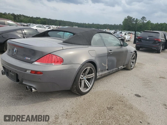 2007 BMW 6 Series M6 z VIN WBSEK93557CY78648, wystawiony jako Copart lot #52179345 z przebiegiem 22 453 mil mil oraz Szkoda całkowita • Salvage title. Historia ofert i sprzedaży dostępna na DreamBid. Obrazek 3.