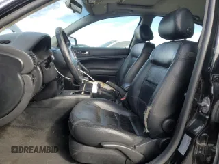 2003 Volkswagen Passat GLS z VIN WVWPD63BX3P113713, wystawiony jako Copart lot #46002415 z przebiegiem 206 144 mil mil oraz Szkoda całkowita • Salvage title. Historia ofert i sprzedaży dostępna na DreamBid. Obrazek 7.