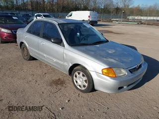 1999 Mazda Protege DX z VIN JM1BJ2227X0148530, wystawiony jako IAAI lot #41863577 z przebiegiem Nie podano mil oraz . Historia ofert i sprzedaży dostępna na DreamBid. Obrazek 1.